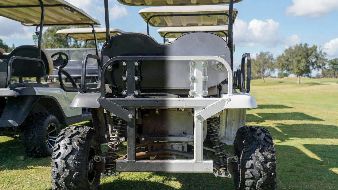 Golf carts on a course showing chassis condition comparison, highlighting rust protection importance for durability and long-term fleet performance.