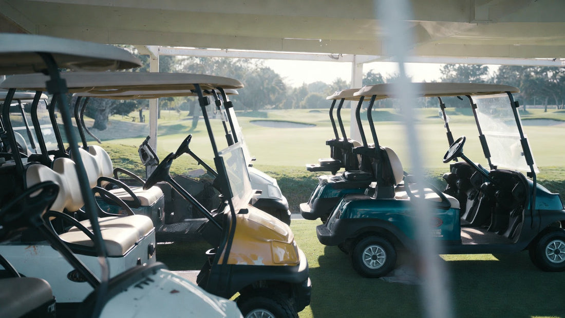 Golf carts exposed to harsh sunlight compared with shaded carts, highlighting UV damage effects on paint and materials.