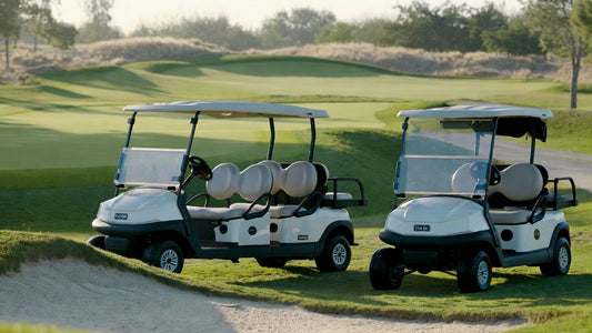 E-Z-GO vs Club Car golf carts on a modern course, highlighting lithium battery technology comparison.