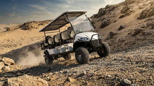 A rugged golf cart navigating steep hills, sand, and rocky paths, symbolizing performance, durability, and reliability in extreme golf course terrain.